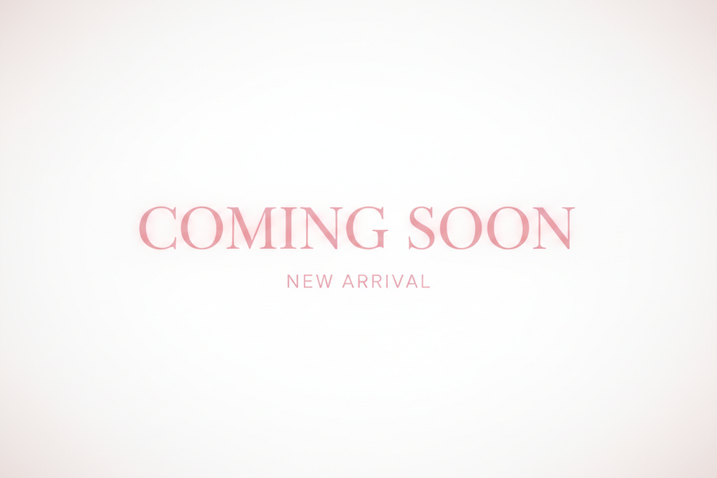 coming soon with light pink letters